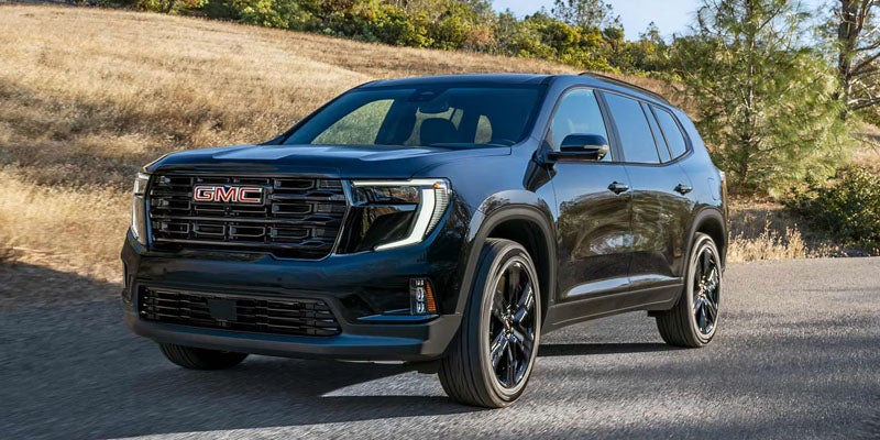 2026 GMC Acadia open highway during a summer road trip near Ogallal
